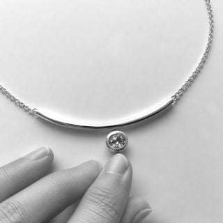 A moissanite necklace by Jane Eppstein