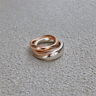 A rose gold sculptural wedding ring