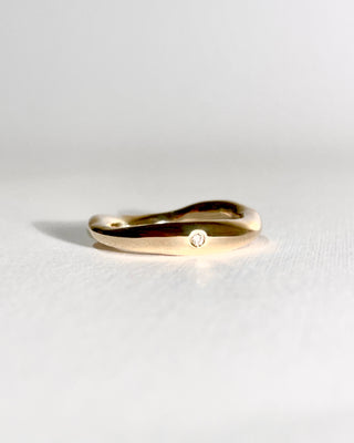 Gold Worn Ring with a diamond